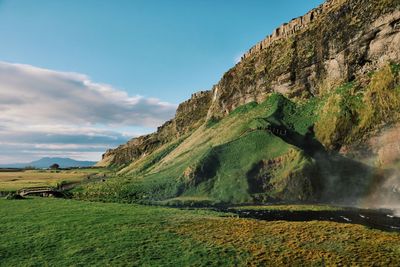 Scenic view of land against sky