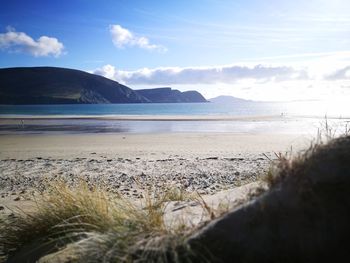 Scenic view of beach against sky