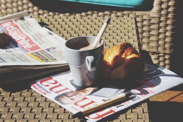 indoors, table, food and drink, still life, book, high angle view, paper, close-up, text, freshness, food, no people, drink, communication, education, day, wood - material, western script, focus on foreground, refreshment