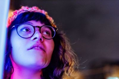 Close-up portrait of woman with eyeglasses