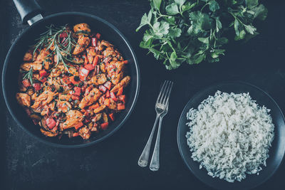 High angle view of chopped vegetables in bowl on table