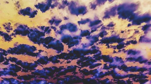 Low angle view of clouds in sky during sunset