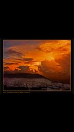 Scenic view of dramatic sky during sunset