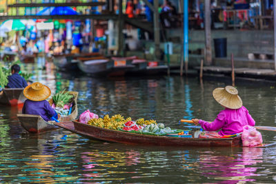 People sitting in a lake