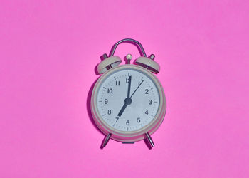 Close-up of clock on wall