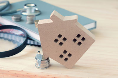 Close-up of model home on table