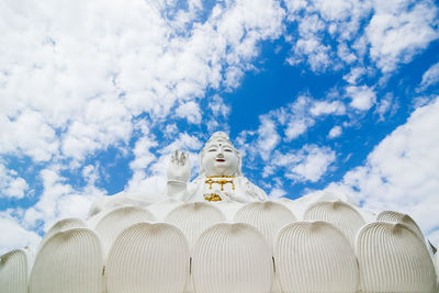 Low angle view of statue against sky