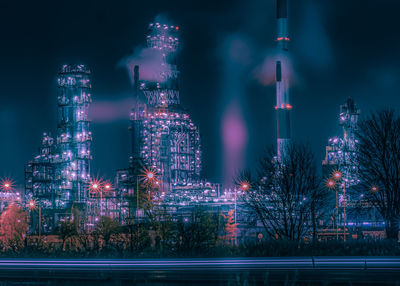 Illuminated buildings in city at night