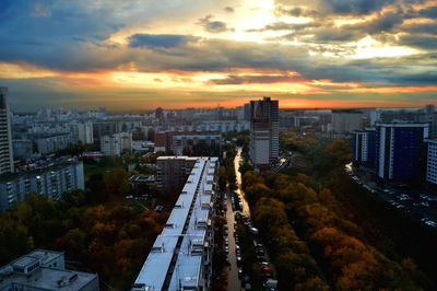 High angle view of buildings against sky during sunset