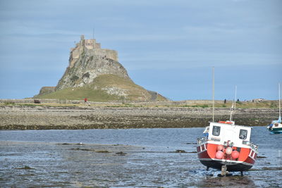 Historical castle and a fishing boat