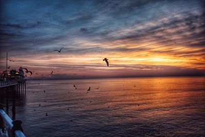 View of calm sea at sunset