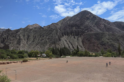 Panoramic view of mountain range against sky