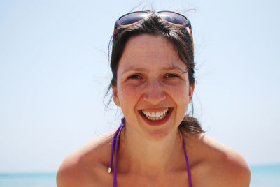 Close-up of young smiling woman