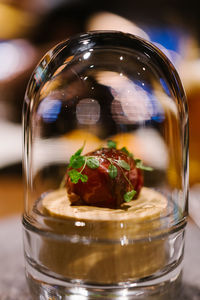 Close-up of drink in glass jar on table