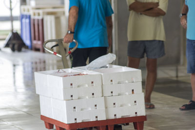 White containers with catch of sea fish. industrial catch of fresh fish. fish auction.