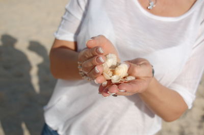 Close-up of woman holding ice cream