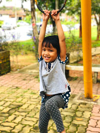 Portrait of a girl standing outdoors