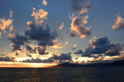 Scenic view of sea against sky at sunset