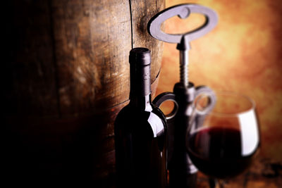 Close-up of wine bottles on table