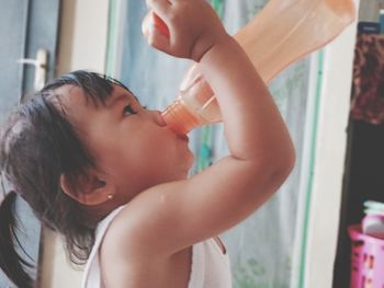 Portrait of cute girl at home