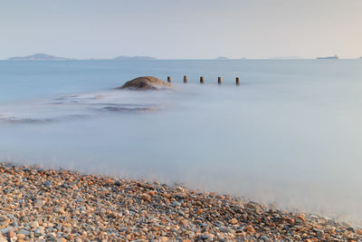 Scenic view of sea against clear sky