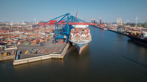 High angle view of commercial dock against clear sky