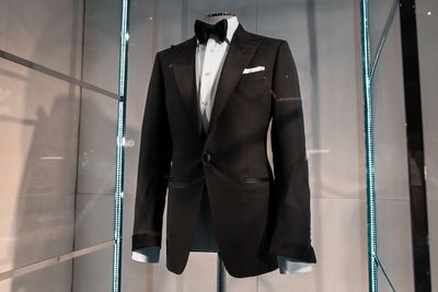 Clothes hanging on rack in store