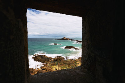 Scenic framed view from a window on the sea against sky at st-malo in the bretagne