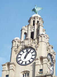 Low angle view of clock tower