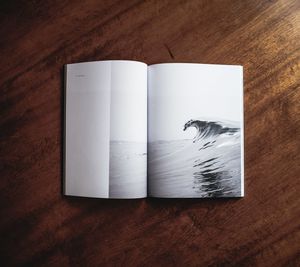 High angle view of open book on table