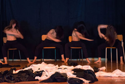 High angle view of people sitting on table