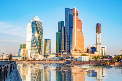 Modern buildings against sky in city