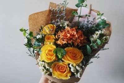 Close-up of rose bouquet against white background