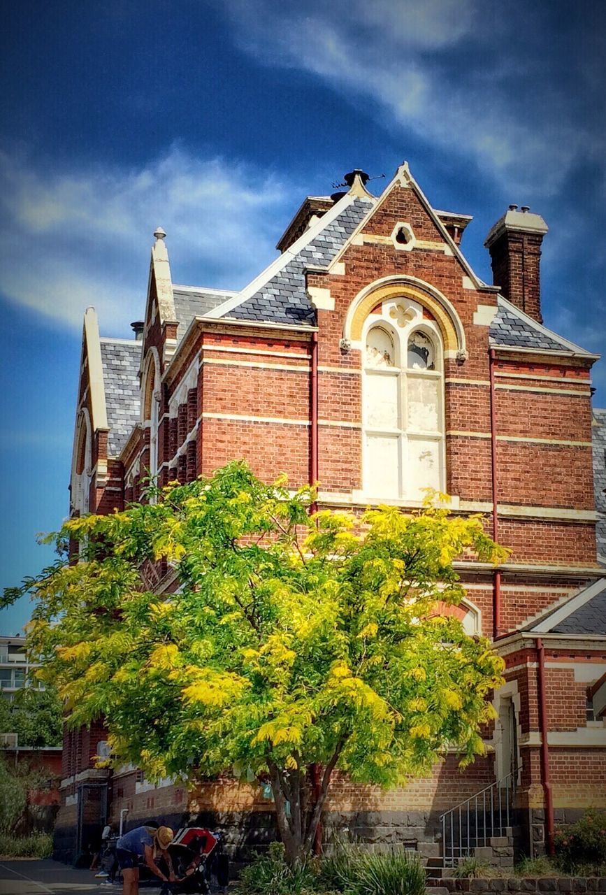 building exterior, architecture, built structure, sky, cloud - sky, tree, house, cloud, place of worship, church, growth, cloudy, facade, religion, plant, day, outdoors, low angle view, spirituality