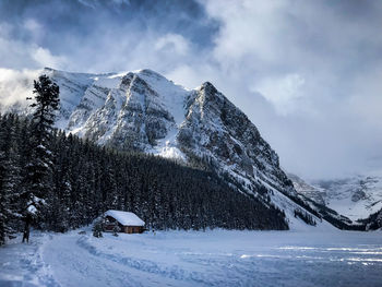 Scenic view of snow covered mountain against sky