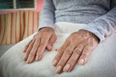 Close-up of woman holding hands