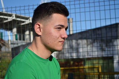 Portrait of young man looking away