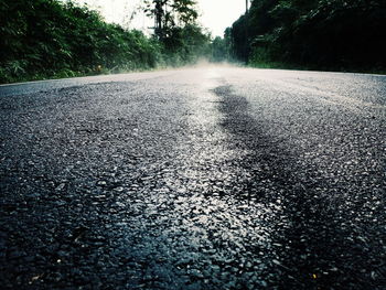 Surface level of wet road in city