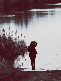 Man standing in lake