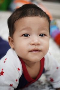 Portrait of cute baby at home