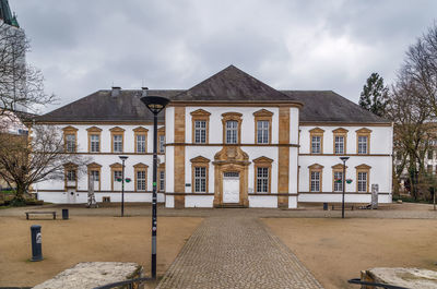 Facade of building against sky