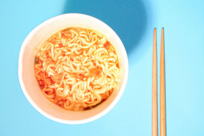 Directly above shot of soup in bowl on white background