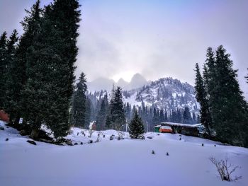 Scenic view of snow mountains against sky