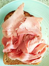 High angle view of pink bread on table