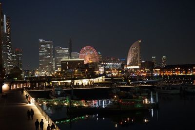 Illuminated cityscape at night