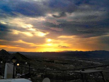 Scenic view of landscape against sky during sunset