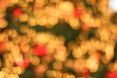 Defocused image of illuminated christmas tree