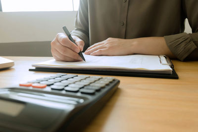 Midsection of a man on table