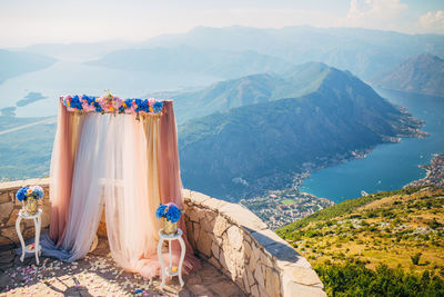 Panoramic view of hanging from mountain range against sky