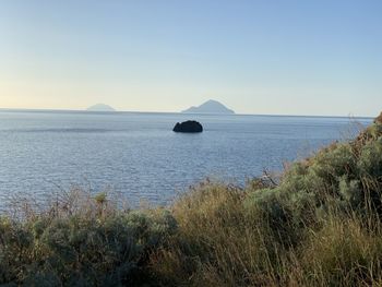 Scenic view of sea against clear sky